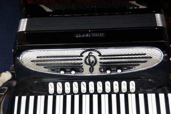 A cased Giulietti Classic 127 accordion, 21.5in.